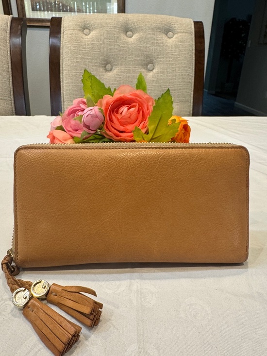 Gucci Handbags - Authentic Gucci Leather Zip-Around Wallet with GG Tassel Accent